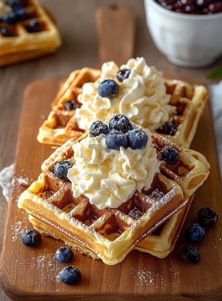 Waffles with cream and blueberries